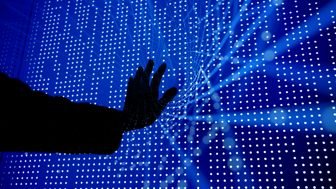 hand and computer code